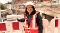 Mai-Trang Ly in Arbeitskleidung auf einer Baustelle